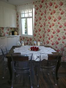 a kitchen with a table with a table cloth on it at Villa Wilmarie in Rottweil