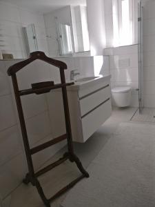 a bathroom with a sink and a toilet at Villa Wilmarie in Rottweil