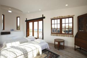 Postel nebo postele na pokoji v ubytování 伊豆下田 - Shimoda Beach House1
