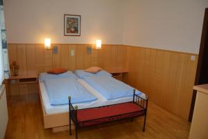 Cama ou camas em um quarto em Pension Kreischberg Mayer