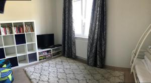 Telewizja i/lub zestaw kina domowego w obiekcie Jantar