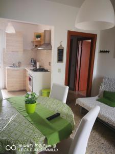 Kuchyňa alebo kuchynka v ubytovaní Villa Galilei Rooms