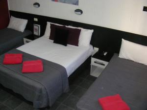 Postel nebo postele na pokoji v ubytování Motel Lodge