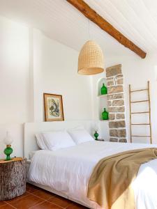 
Uma cama ou camas num quarto em Casa Saloia Sintra
