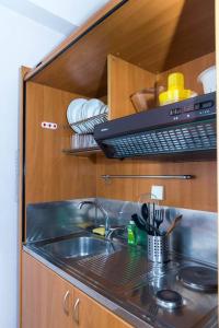 Kuchnia lub aneks kuchenny w obiekcie Sitia Old Port Apartment