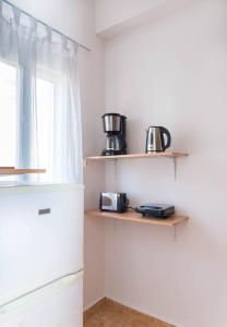 Kuchnia lub aneks kuchenny w obiekcie Sitia Old Port Apartment