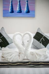 Кровать или кровати в номере Aurora Suvarnabhumi