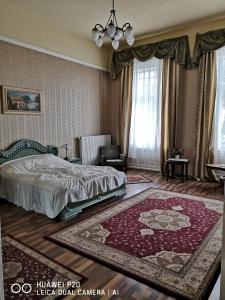 Een bed of bedden in een kamer bij Kakukk Panzió