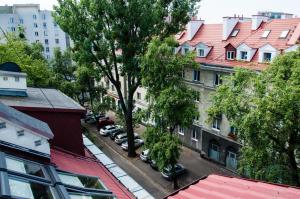 an overhead view of a city street with buildings at Attic Apartment Warszawa in Warsaw