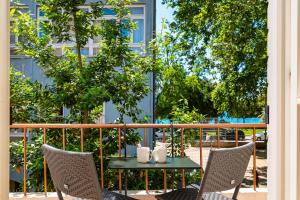 Balkón nebo terasa v ubytování Idassa Palace rooms + 18 fotografií
