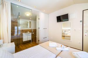 Posteľ alebo postele v izbe v ubytovaní Idassa Palace rooms