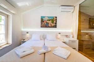 Posteľ alebo postele v izbe v ubytovaní Idassa Palace rooms