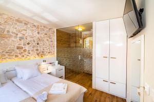 Posteľ alebo postele v izbe v ubytovaní Idassa Palace rooms