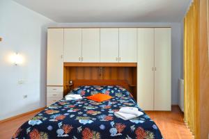 Postel nebo postele na pokoji v ubytování Pool Apartments 624