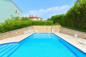 Bazén v ubytování Pool Apartments 624 nebo v jeho okolí