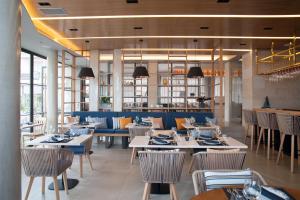 Restoran või mõni muu söögikoht majutusasutuses Seasabelle Hotel near Athens Airport