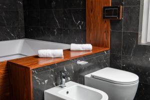 Koupelna v ubytování Casa tua Spa Resort