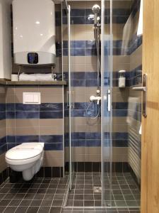 Kúpeľňa v ubytovaní Hotel Resurs