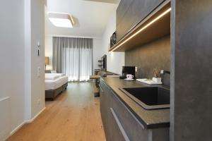 Ein Bett oder Betten in einem Zimmer der Unterkunft Hotel Gösser Bräu
