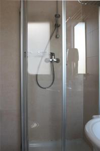 Koupelna v ubytování Hotel Vittoria