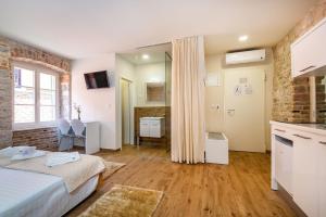 Kuchyň nebo kuchyňský kout v ubytování Idassa Atrium rooms