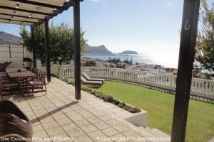 a patio with a view of the ocean at First Balcony - Porto Santo in Porto Santo
