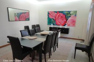 a dining room with a table and chairs at First Balcony - Porto Santo in Porto Santo