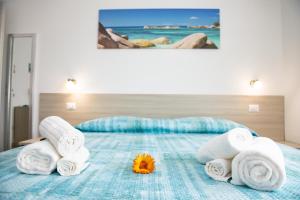 Postel nebo postele na pokoji v ubytování B&B Il Viaggiatore