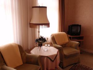 TV a/nebo společenská místnost v ubytování Hotel Richthofen