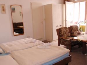 Postel nebo postele na pokoji v ubytování Hotel Richthofen