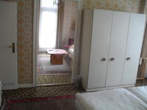 Postel nebo postele na pokoji v ubytování Hotel Richthofen