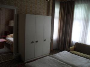 Postel nebo postele na pokoji v ubytování Hotel Richthofen