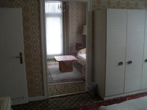 Postel nebo postele na pokoji v ubytování Hotel Richthofen