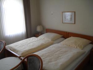 Postel nebo postele na pokoji v ubytování Hotel Richthofen