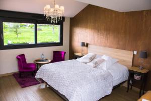 Postel nebo postele na pokoji v ubytování La Chambre Enchantée
