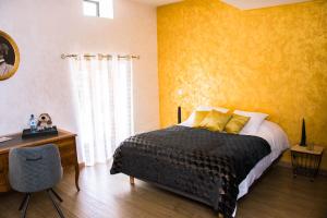 Postel nebo postele na pokoji v ubytování La Chambre Enchantée
