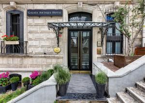 a entrance to a building with a glass door at Galata Antique Hotel - Special Category in Istanbul
