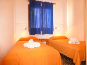 Ein Bett oder Betten in einem Zimmer der Unterkunft Rentalmar El Capitan