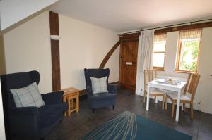 O zonă de relaxare la Whitewells Farm Cottages