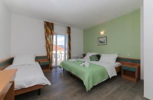 Fotografie z fotogalerie ubytování Downtown Private Rooms Mandić v destinaci Supetar