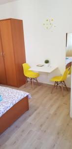 Postel nebo postele na pokoji v ubytování Apartments & Studio Matan