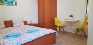 Postel nebo postele na pokoji v ubytování Apartments & Studio Matan