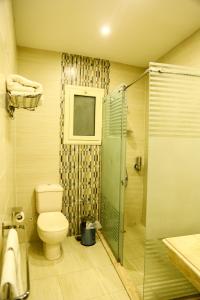 Vonios kambarys apgyvendinimo įstaigoje Villa 14 Suites