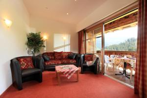 A seating area at Gasthaus Obergaisberg