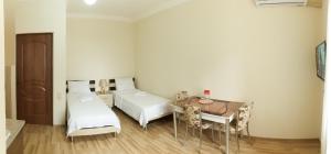 Postel nebo postele na pokoji v ubytování Hotel Tao