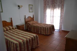 Cama o camas de una habitación en Caserio De Vazquez 1