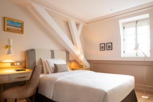 Cama ou camas em um quarto em Hôtel Longemalle