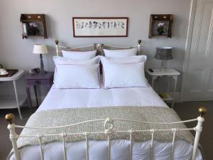 Ένα ή περισσότερα κρεβάτια σε δωμάτιο στο Anne’s House