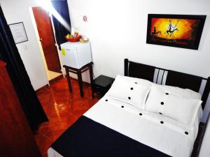 Postel nebo postele na pokoji v ubytování Hotel Casa Sarita