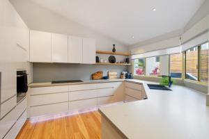 A kitchen or kitchenette at 131 Pacific Drive, Port Macquarie